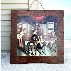 Vintage art featuring the iconic album cover for Aerosmith's 1976 release Rocks